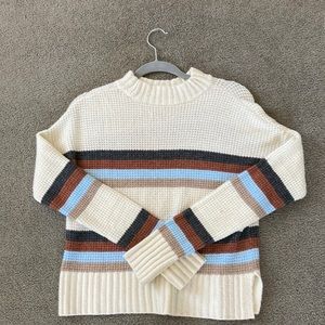 white multicolored sweater